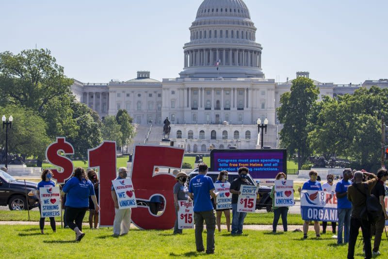 Members of the Service Employee International Union hold a rally in support of a $15-an-hour minimum wage outside the U.S. Capitol in 2021. File Photo by Tasos Katopodis/UPI
