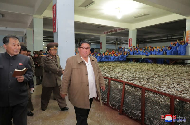 North Korean leader Kim Jong Un visits a fish processing facility in North Korea