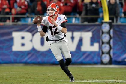 Brice Ramsey #12 rolls out against Louisville during the Belk Bowl at Bank of America Stadium on December 30, 2014 in Charlotte, North Carolina. (Photo by Grant Halverson/Getty Images)