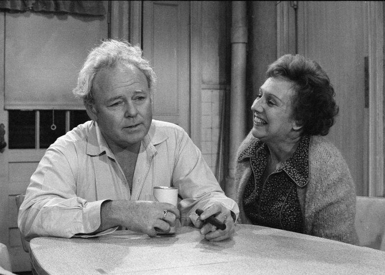 LOS ANGELES - DECEMBER 3: All In The Family. Episode: 'Archie's Chair'. Featuring Carroll O'Connor (as Archie Bunker) and Jean Stapleton (as Edith Bunker). Negative dated December 3, 1976. (Photo by CBS via Getty Images)