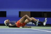 Nick Kyrgios, of Australia, takes a hard spill after returning a shot to Daniil Medvedev, of Russia, during the fourth round of the U.S. Open tennis championships, Sunday, Sept. 4, 2022, in New York. (AP Photo/Adam Hunger)