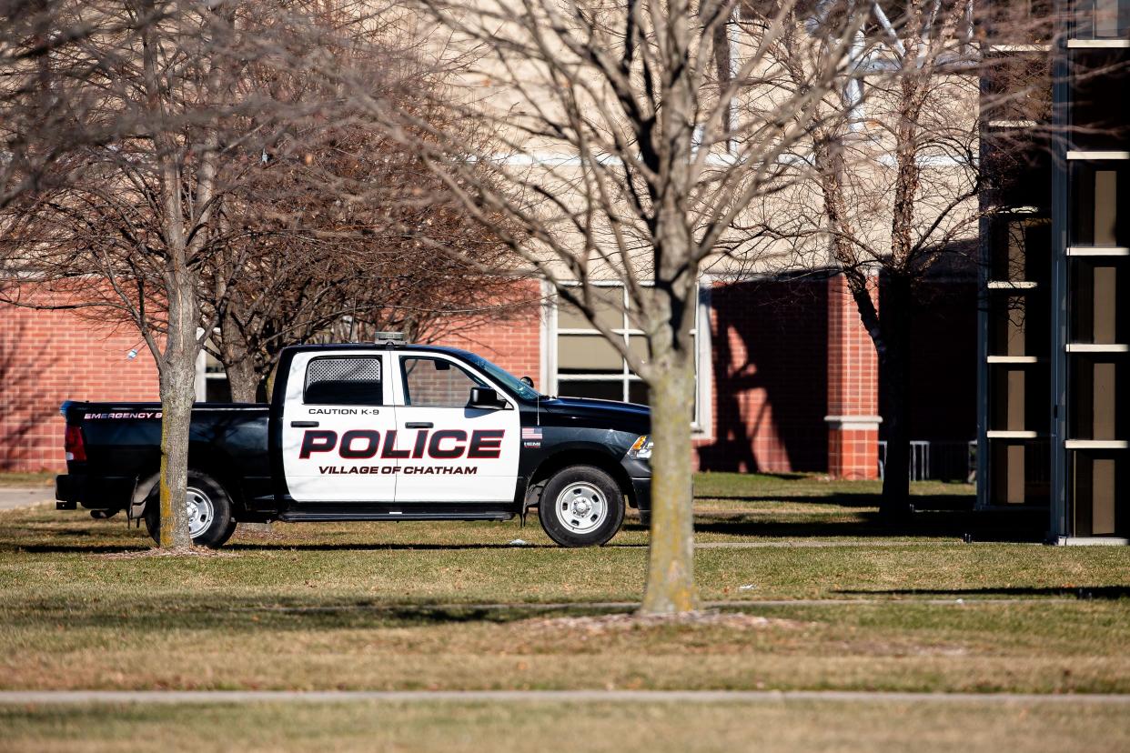 A Chatham Police K9 unit is parked outside Glenwood High School as the school goes on soft lockdown after a threat was made via the Yik Yak messaging platform to the school in Chatham on Wednesday. [Justin L. Fowler/The State Journal-Register]