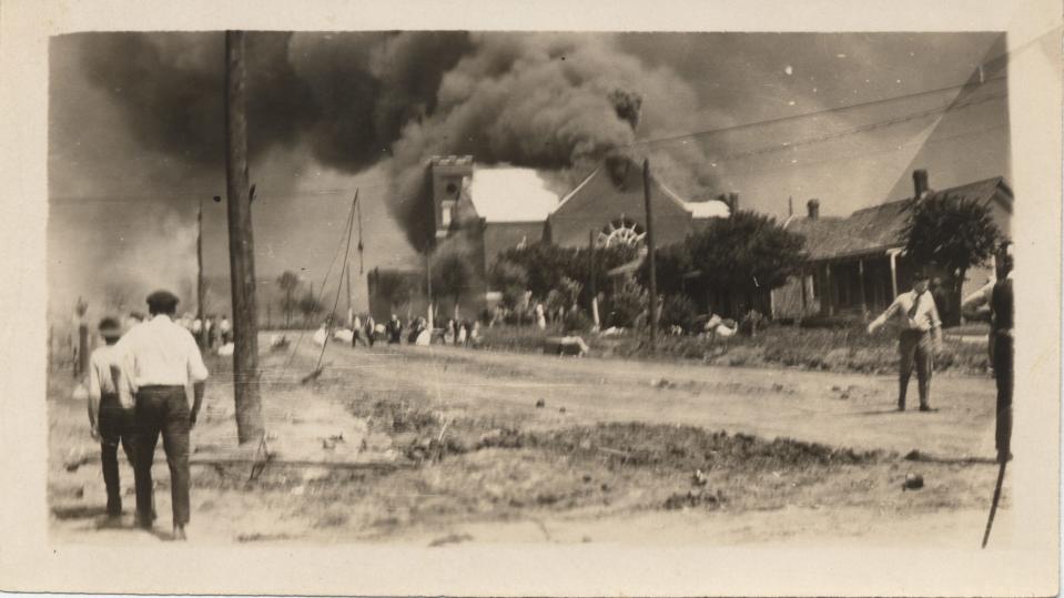 People watch the Mt. Zion Baptist Church burn, June 1, 1921.