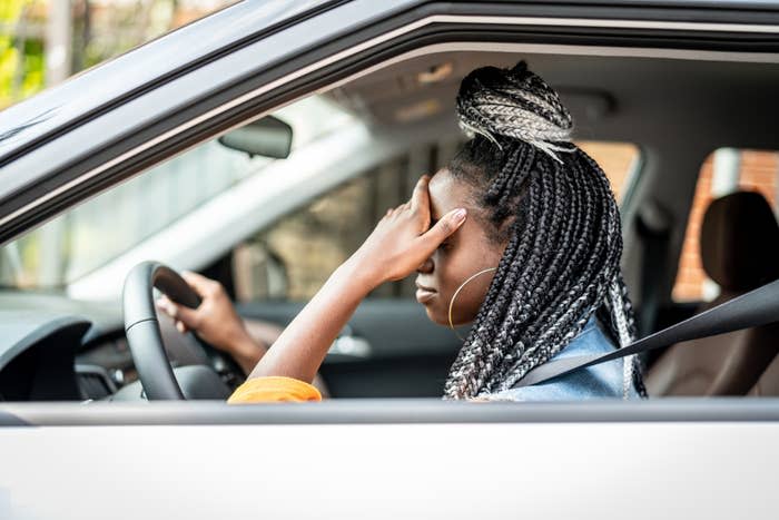 a frustrated driver in a car