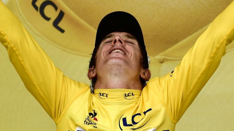 Geraint Thomas celebrates regaining the yellow jersey after the penultimate stage of the Tour de France