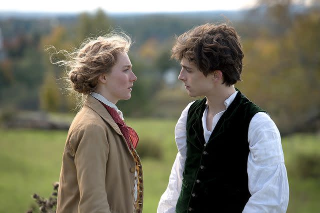 <p> Columbia Pictures</p> Saoirse Ronan and Timothée Chalamet in <i>Little Women</i>, 2019.