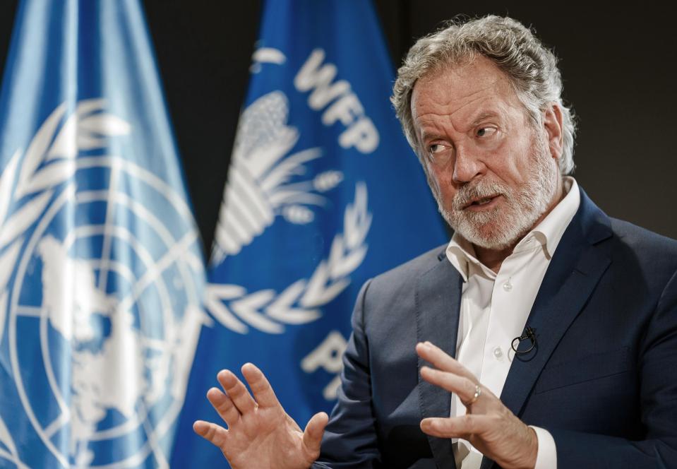 FILE -World Food Program Executive Director David Beasley speaks during an interview with The Associated Press at the WFP headquarters in Rome, Tuesday, Nov. 2, 2021. Beasley, the U.N. food chief warned Thursday, Sept. 22, 2022 that the world is facing “a perfect storm on top of a perfect storm” and urged donors, particularly Gulf nations and billionaires, to give a few days of profits to tackle a crisis with the fertilizer supply right now and prevent widespread food shortages next year. (AP Photo/Domenico Stinellis, File)