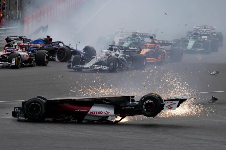 Alfa Romeo driver Zhou Guanyu crashes on the first lap of the British Grand Prix (Frank Augstein/AP). (AP)