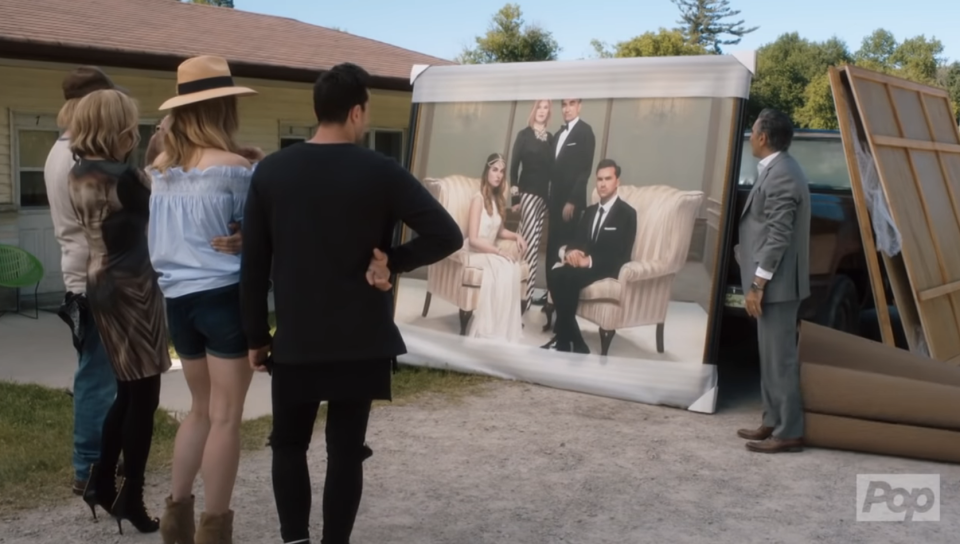from 'Schitt's Creek': The family stares at a giant portrait of themselves