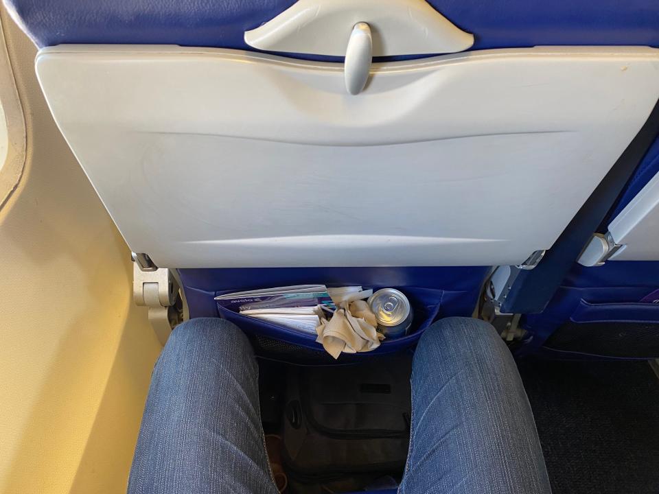 The leg room on Avelo's Boeing 737-700. This reporter is 5 feet, 11 inches for reference.