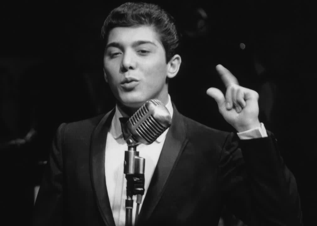 Paul Anka singing in concert.