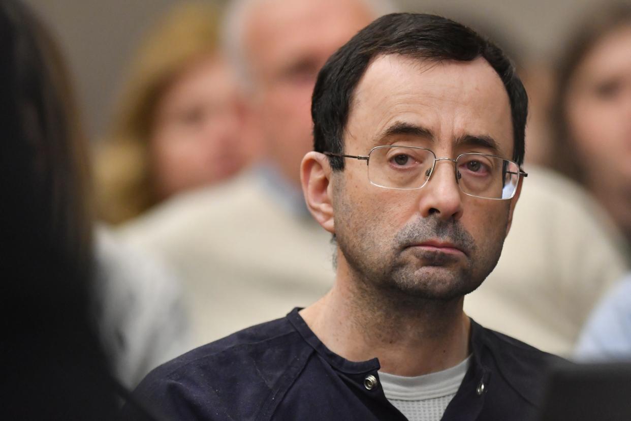 There was little reaction of the face of Larry Nassar as Ingham County Circuit Judge Rosemarie Aquilina delivered her sentence  Wednesday, Jan. 24, 2018, after the seventh day of victim impact statements in Ingham County Circuit Court.