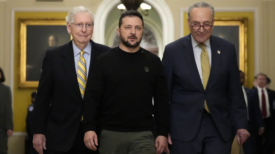 Ukrainian President Volodymyr Zelensky walks with Senate Minority Leader Mitch McConnell (R-Ky.) and Senate Majority Leader Chuck Schumer (D-N.Y.) at the US Capitol on Dec. 12, 2023. (Photo by Drew Angerer/Getty Images) - Drew Angerer/Getty Images