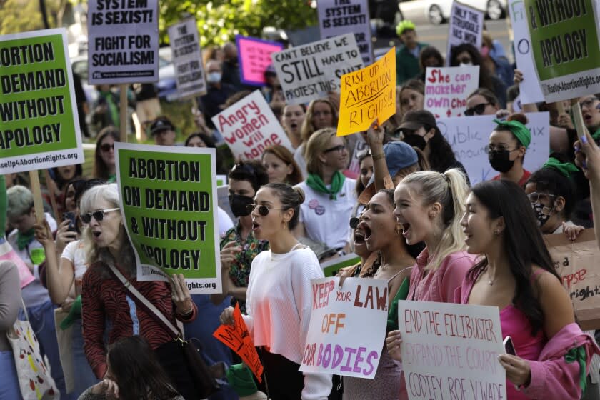 LOS ANGELES, CA - MAY 3, 2022 - - Hundreds rally over a purported report that the Supreme Court is ready to overturn Roe vs. Wade and allow states to outlaw abortion, according to a purported draft opinion that was leaked to Politico, in front of the U.S. Courthouse in downtown Los Angeles on May 3, 2022. (Genaro Molina / Los Angeles Times)