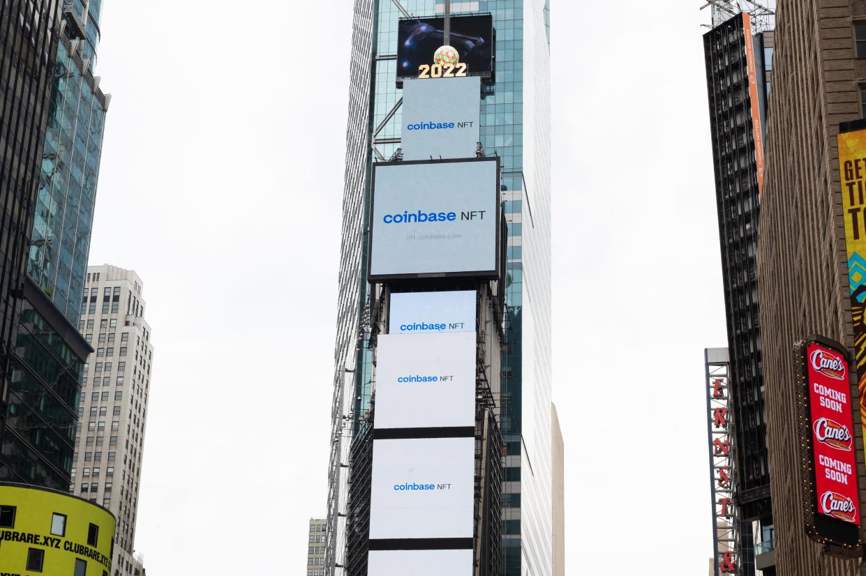 Coinbase NFT billboards are seen in Times Square during the 4th annual NFT.NYC conference on June 23, 2022 in New York City. The four-day event featured 1,500 speakers from the crypto and NFT space with over 14,000 guests in attendance.