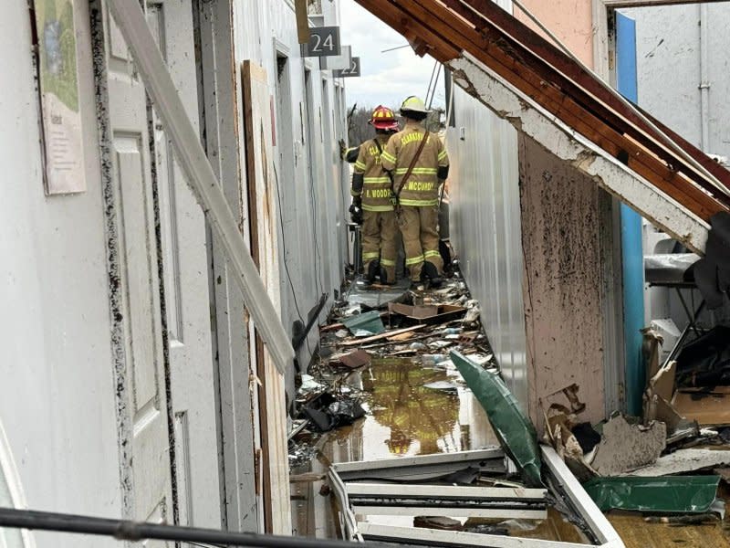 Fire and rescue personnel searched through the wreckage of homes destroyed by a tornado Saturday in Clarksville, Tenn., where at least three people were reported killed in the storms. Rescue operations in the Montgomery County city were ongoing on Sunday, officials said. Photo courtesy Clarksville Fire Rescue/Facebook