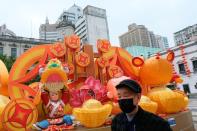 A man wears a mask downtown following the coronavirus outbreak in Macau