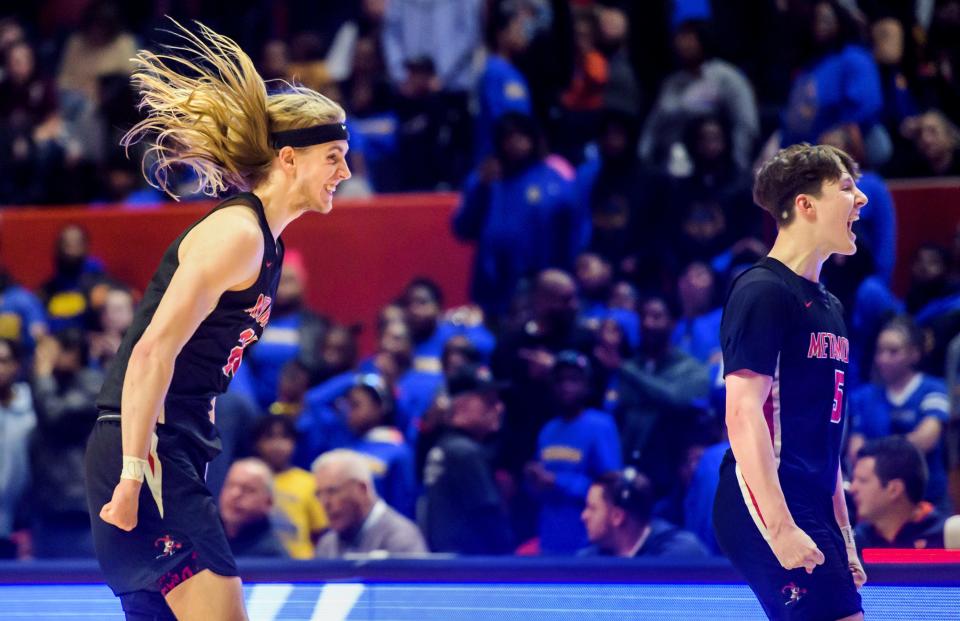 Metamora's Ethan Kizer, left, and Matthew Zobrist start the celebration as time runs out on their 46-42 victory over Chicago Simeon in the Class 3A basketball state title game Saturday, March 11, 2023 at State Farm Center in Champaign.