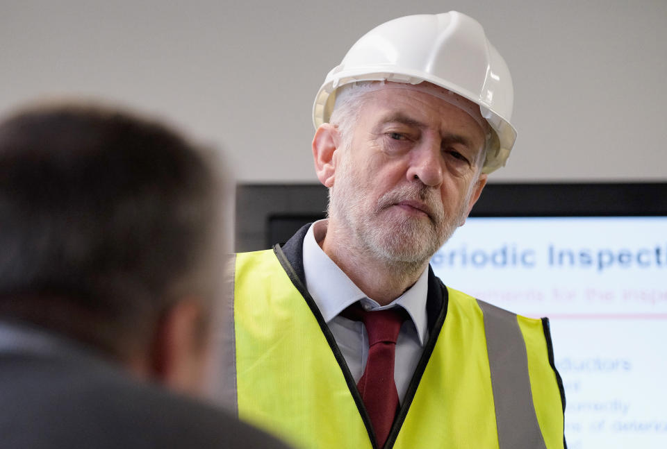 MIDDLESBROUGH, ENGLAND - JANUARY 28:  Labour leader Jeremy Corbyn talks to former SSI steelworkers as he visits the Science, Technology, Engineering and Maths (STEM) further education college on January 28, 2016 in Middlesbrough, England. The visit to Middlesbrough College came as Mr Corbyn visited the region to see how further education colleges in the area are dealing with the aftermath of the closure of the SSI UK Steel plant in Redcar last year by training students and apprentices for future jobs in the petro-chemical, engineering and off shore sectors. (Photo by Ian Forsyth/Getty Images)