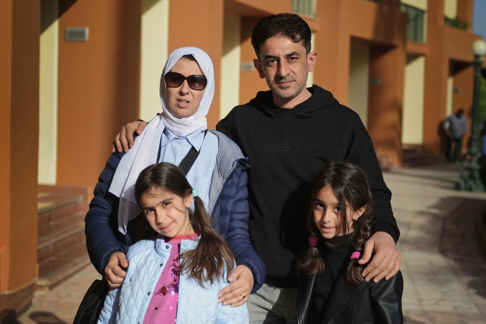 Nuha Bashir with her husband, Ahmed, and their twin daughters in Cairo, Egypt, in January 2024 after fleeing the Gaza Strip.