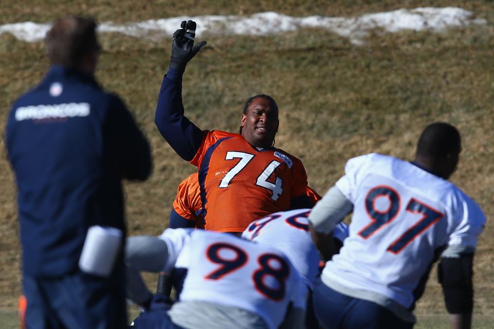 Orlando Franklin of the Denver Broncos warms up as the team practices at the Paul D. Bowlen Memorial Broncos Centre. (Getty Images)