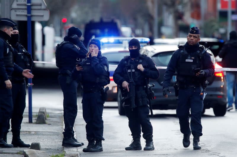 French police secure an area after a knife attack in a public park in Villejuif