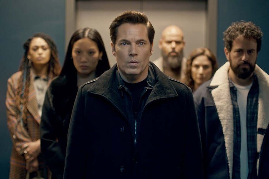 The cast of SurrealEstate appears in a triangle formation facing forward with Luke Roman (Tim Rozon) at the head in SurrealEstate Season 2 Episode 9 -- 