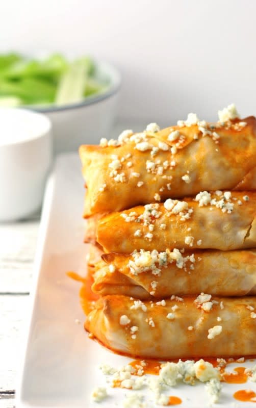 <p>Honey and Birch</p><p>The best way to serve these spicy buffalo stuffed rolls? With a side of even more buffalo sauce!</p><p><strong>Get the recipe: <a href="http://www.honeyandbirch.com/baked-buffalo-chicken-egg-rolls/" rel="nofollow noopener" target="_blank" data-ylk="slk:Baked Buffalo Chicken Egg Rolls;elm:context_link;itc:0;sec:content-canvas" class="link ">Baked Buffalo Chicken Egg Rolls</a></strong></p>