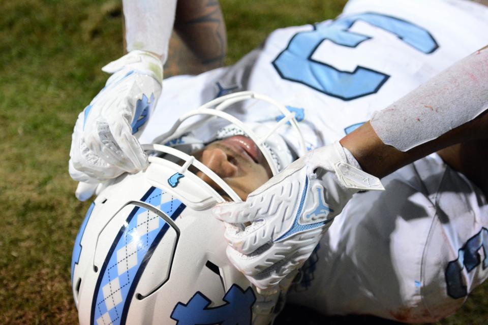 North Carolina receiver Antoine Green reacts after dropping what would’ve been a touchdown catch in the end zone against N.C. State during the second half Friday night at Carter-Finley Stadium.