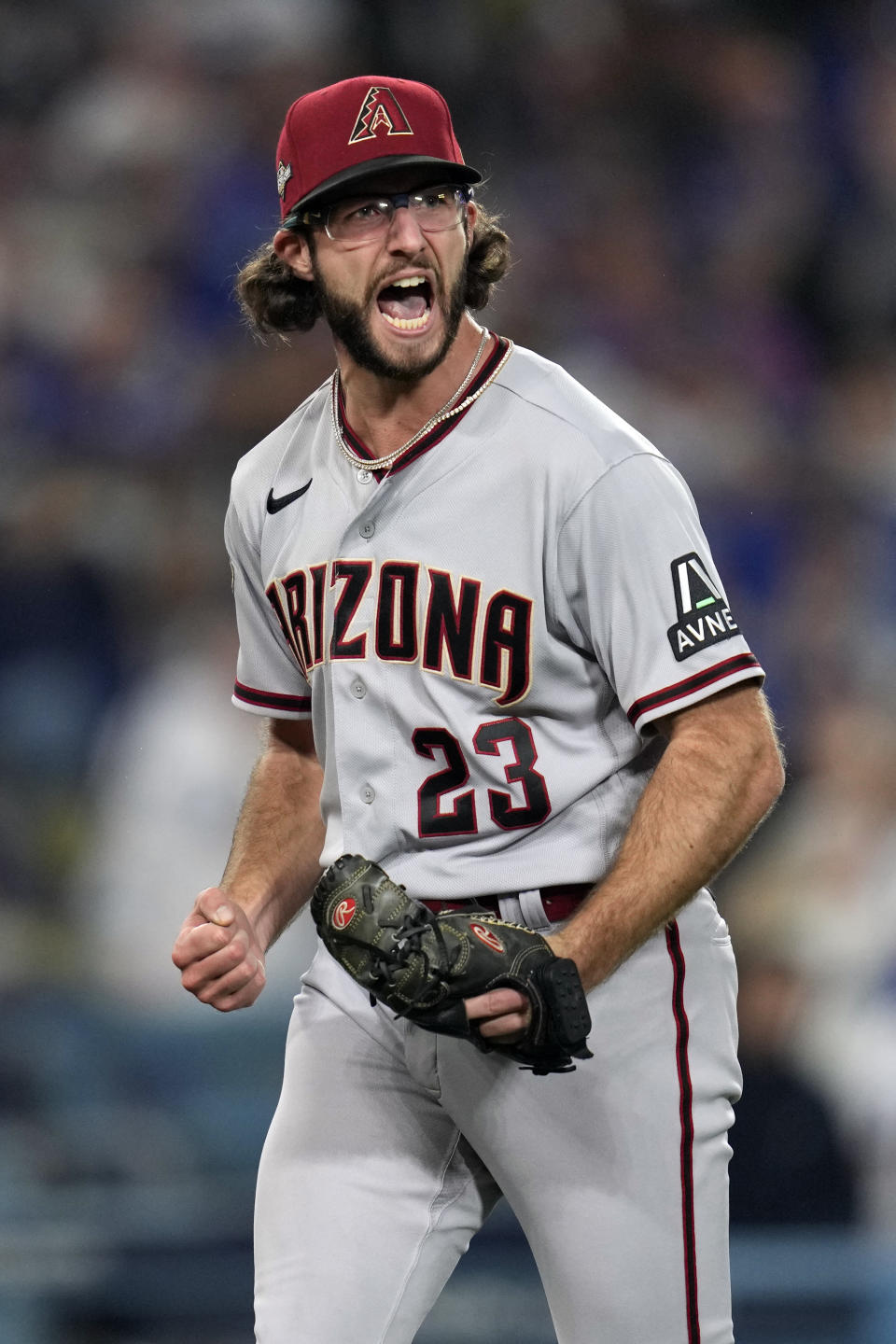 Arizona Diamondbacks starting pitcher Zac Gallen (23) reacts after striking out Los Angeles Dodgers' Freddie Freeman during the fifth inning in Game 2 of a baseball NL Division Series, Monday, Oct. 9, 2023, in Los Angeles. (AP Photo/Ashley Landis)