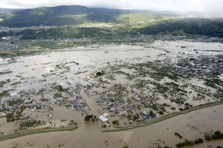 An aerial view shows residential areas flooded by the Chikuma river, caused by Typhoon Hagibis in Nagano, central Japan