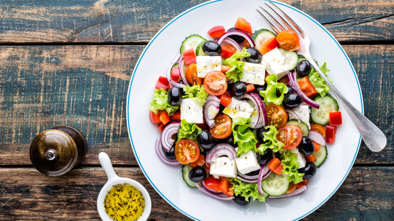 Greek salad on white plate