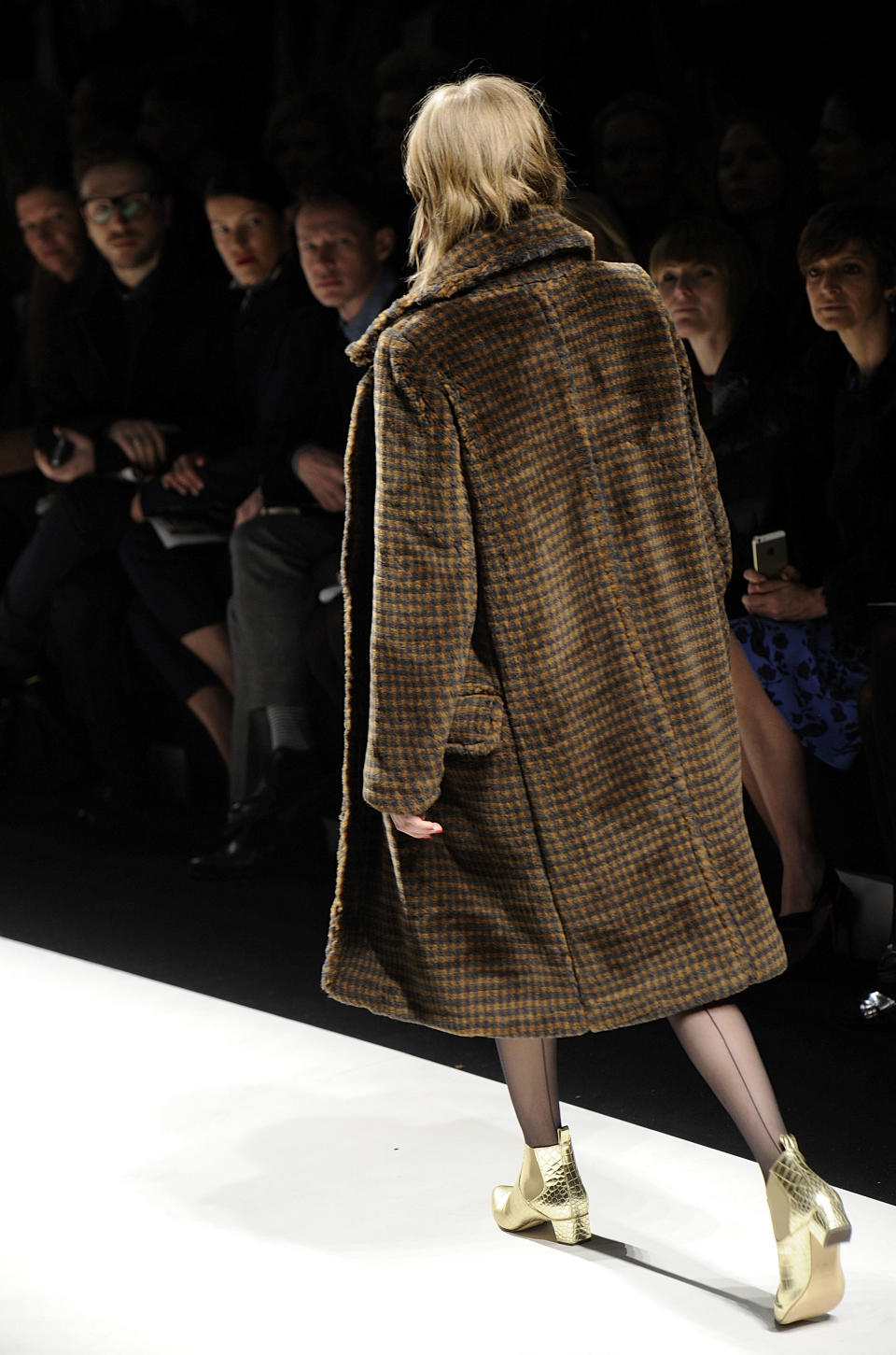 A model wears a creation for Max Mara women's Fall-Winter 2014-15 collection, part of the Milan Fashion Week, unveiled in Milan, Italy, Thursday, Feb. 20, 2014. (AP Photo/Giuseppe Aresu)