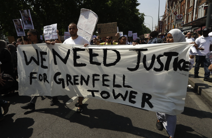 Protestors were seen outside Parliament earlier today (Picture: REX)