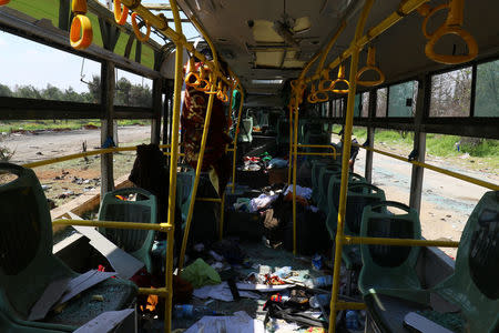 The interior of a damaged bus is seen after an explosion yesterday at insurgent-held al-Rashideen, Aleppo province, Syria April 16, 2017. REUTERS/Ammar Abdullah