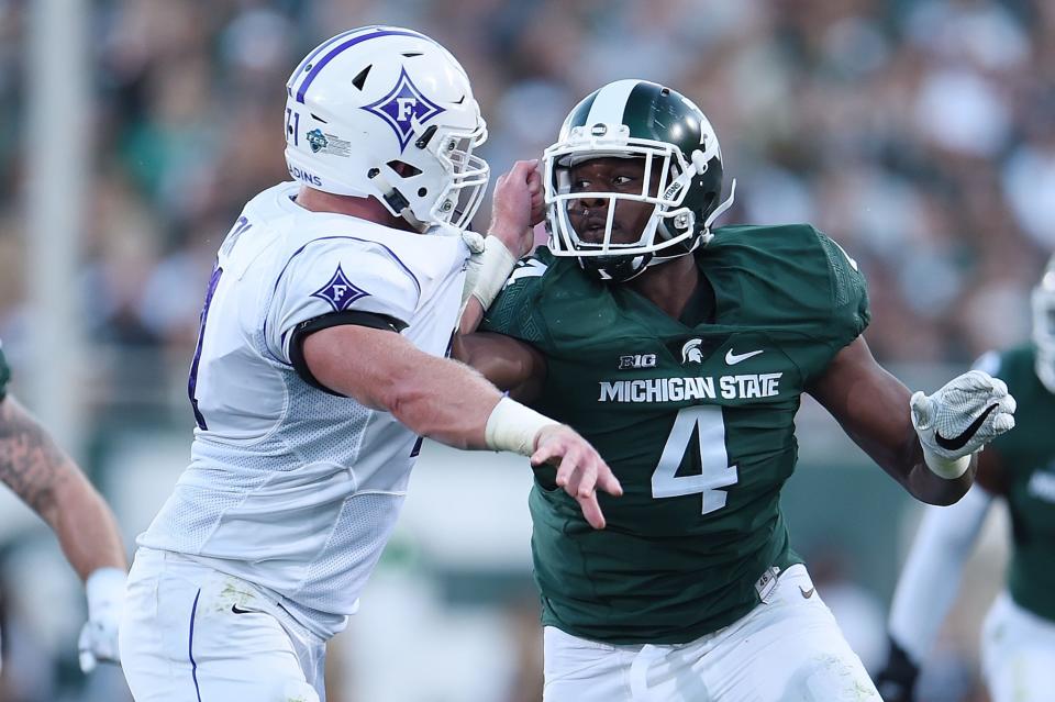 Malik McDowell had seven tackles for loss in nine games. (Getty)