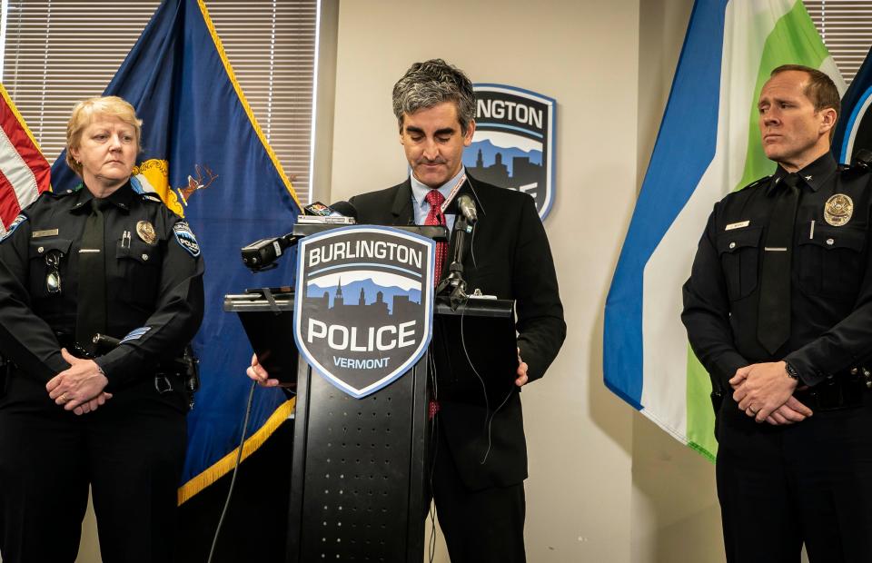 From left, Burlington Police Department Deputy Chief jan Wright listens to Mayor Miro Weinberger announce the resignation of Chief Brandon del Pozo after revelations that he created a fake Twitter account and harassed a city resident. Deputy Chief Jon Murad, right, has been named Acting Chief after Wright admitted that she used a fake Facebook account.