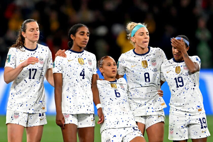 USA players react as Sophia Smith of USA misses her team's fifth penalty in the penalty shoot out
