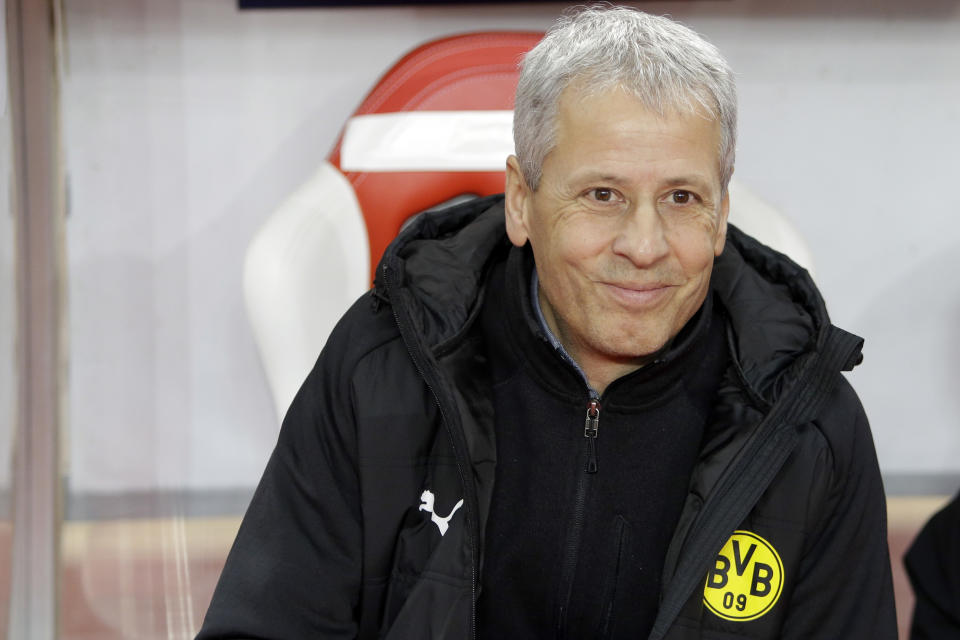 Dortmund's head coach Lucien Favre looks on prior to the Champions League group A soccer match between AS Monaco and Borussia Dortmund, in Monaco, Tuesday, Dec. 11, 2018. (AP Photo/Claude Paris)