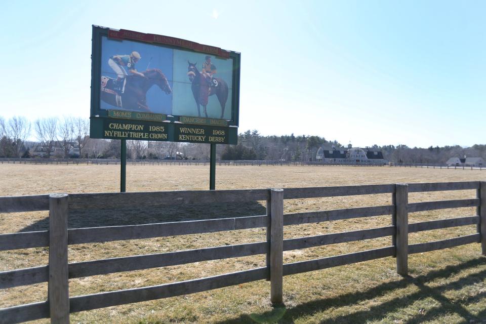 The historic Runnymede Farm is a treasured local property, where a billboard boasts of racing horses' past success.