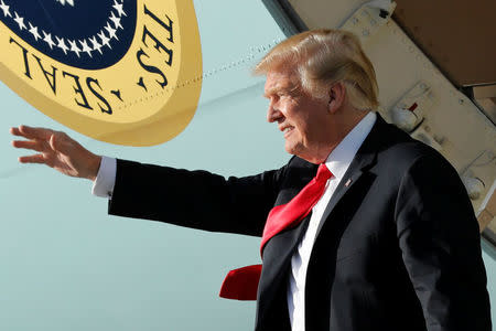 U.S. President Donald Trump arrives at Palm Beach International Airport, Florida, U.S. for the Easter weekend at Mar-a-Lago in Palm Beach March 29, 2018. REUTERS/Yuri Gripas/Files