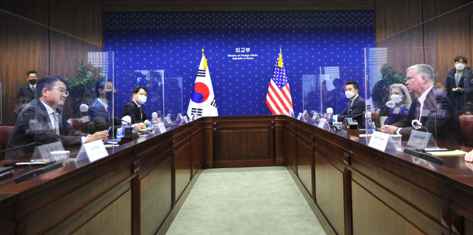 U.S. Deputy Secretary of State Stephen Biegun, right, talks with South Korean Vice Foreign Minister Choi Jong Kun, left, during a meeting on North Korea and other issues at the Foreign Ministry in Seoul Wednesday, Dec. 9, 2020. (Korea Pool via AP)