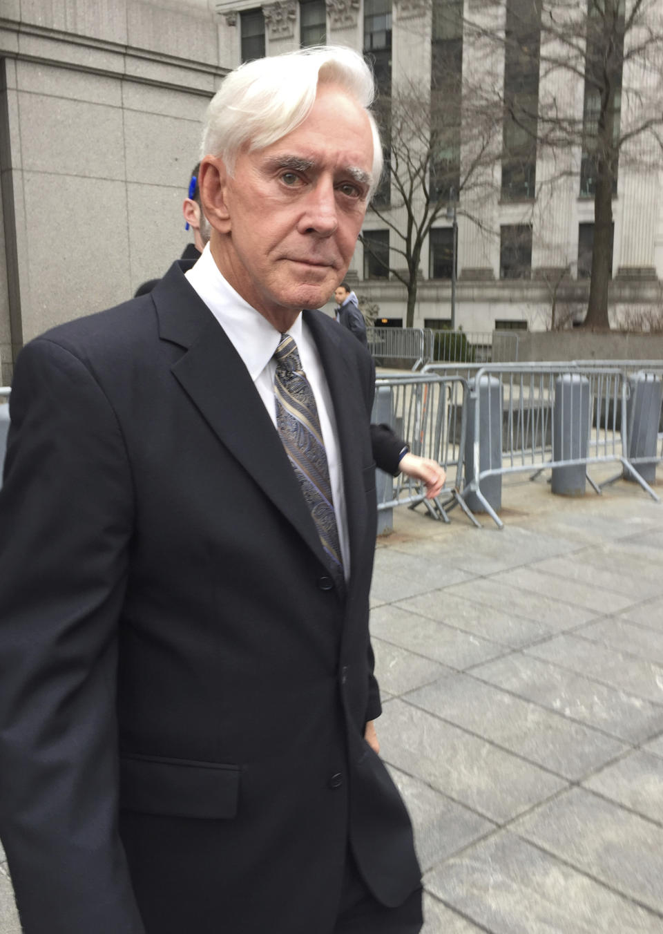 William "Billy" Walters leaves Manhattan federal court in New York, Friday, April 7, 2017, after he was convicted of insider trading charges. The Las Vegas gambler linked to golfer Phil Michelson said outside court that he "just lost the biggest bet of my life." His lawyer promised an appeal. Prosecutors say he earned over $40 million illegally. (AP Photo/Larry Neumeister)