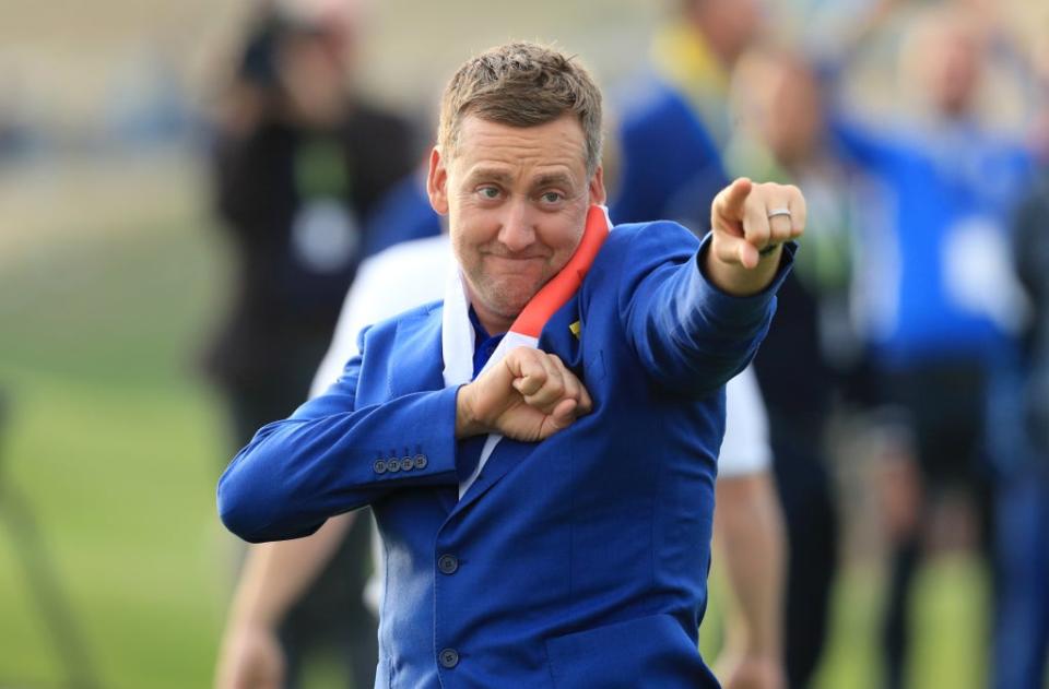 Ian Poulter celebrates after Europe’s Ryder Cup win at Le Golf National (Gareth Fuller/PA) (PA Archive)