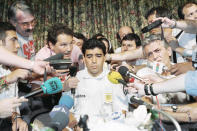 Diego Maradona is surrounded by the media after he was tested positive for doping at the 1994 World Cup in the United States. (PHOTO: AP/Tim Sharp)