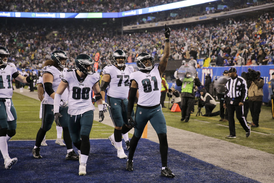 Philadelphia Eagles tight end Josh Perkins (81) celebrates scoring a touchdown in the first half of an NFL football game against the New York Giants, Sunday, Dec. 29, 2019, in East Rutherford, N.J. (AP Photo/Seth Wenig)