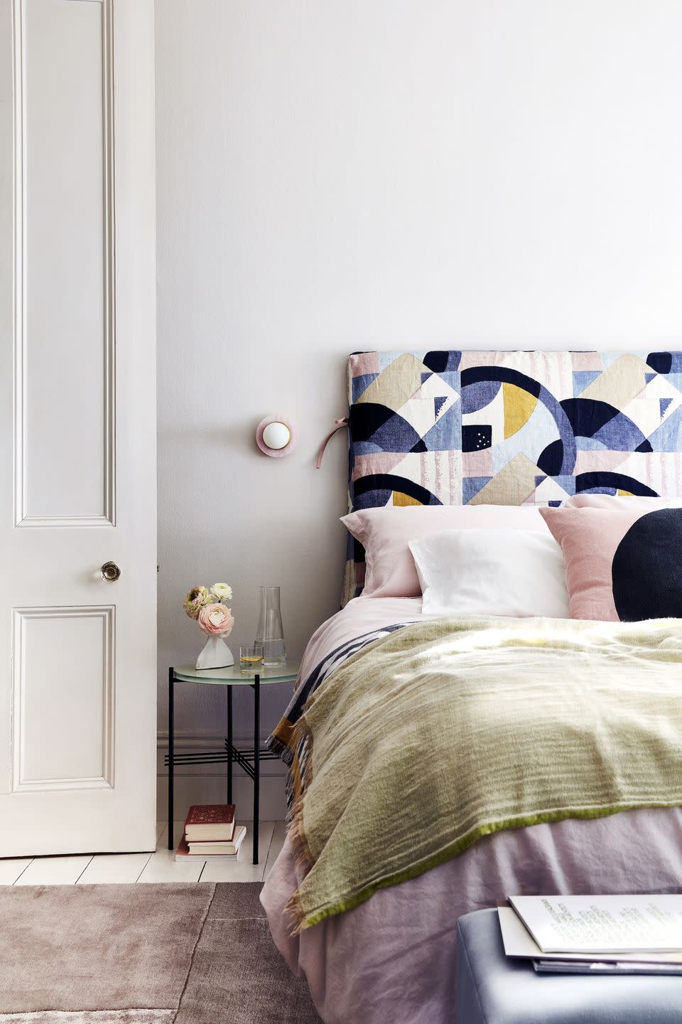 double bed with pink patterned bed