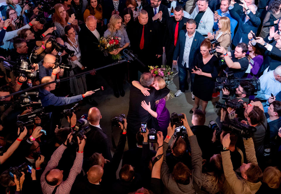 Slovak President Andrej Kiska congratulates Slovakia's President-elect Zuzana Caputova as she wins the election in Bratislava, Slovakia on March 30, 2019. | Joe Klamara—AFP/Getty Images