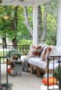 <p>For a covered patio, the easiest way to secure the strands is simply attaching them to each corner of the roof. It makes hanging lights look uniform—not messy.</p><p><strong>See more at <a href="https://inspiredbycharm.com/fall-porch-decorating-ideas/" rel="nofollow noopener" target="_blank" data-ylk="slk:Inspired by Charm;elm:context_link;itc:0;sec:content-canvas" class="link ">Inspired by Charm</a>.</strong></p><p><strong><a class="link " href="https://www.amazon.com/Outdoor-Commercial-Perfect-Backyard-Umbrella/dp/B07B61XR58?tag=syn-yahoo-20&ascsubtag=%5Bartid%7C10050.g.3404%5Bsrc%7Cyahoo-us" rel="nofollow noopener" target="_blank" data-ylk="slk:SHOP STRING LIGHTS;elm:context_link;itc:0;sec:content-canvas">SHOP STRING LIGHTS</a><br></strong></p>