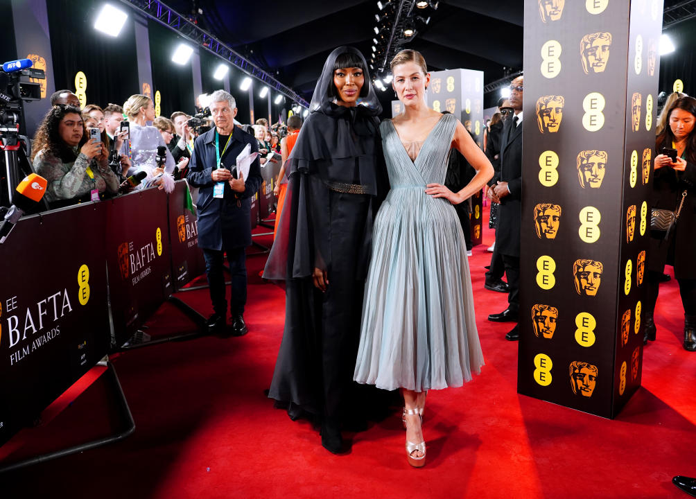 Naomi Campbell and Rosamund Pike attend the Bafta Film Awards 2024, at the Royal Festival Hall, Southbank Centre, London. Picture date: Sunday February 18, 2024. (Photo by Ian West/PA Images via Getty Images)